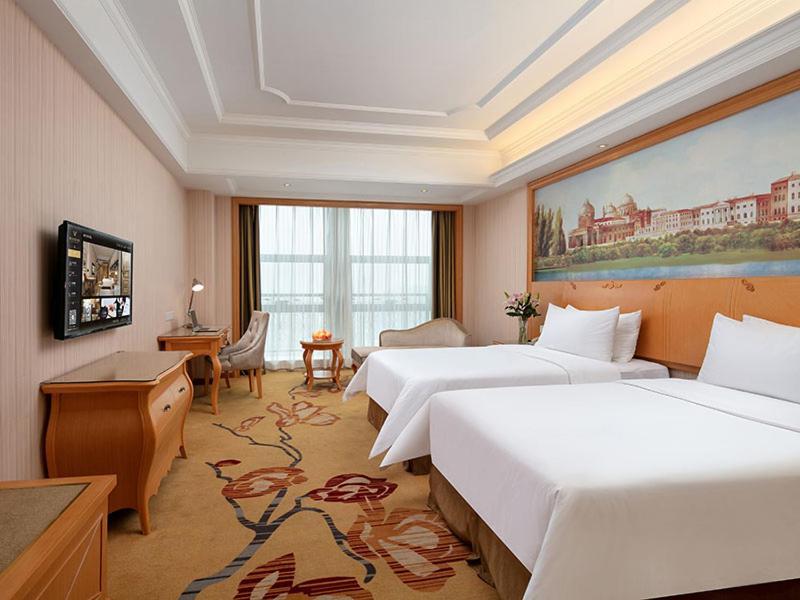 Vienna International Hotel Jiujiang Shili Street Exterior foto