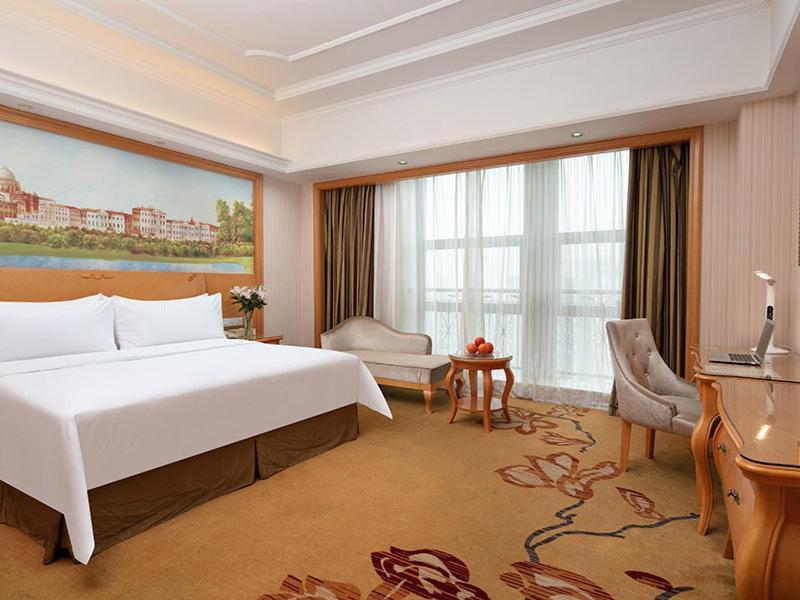 Vienna International Hotel Jiujiang Shili Street Exterior foto